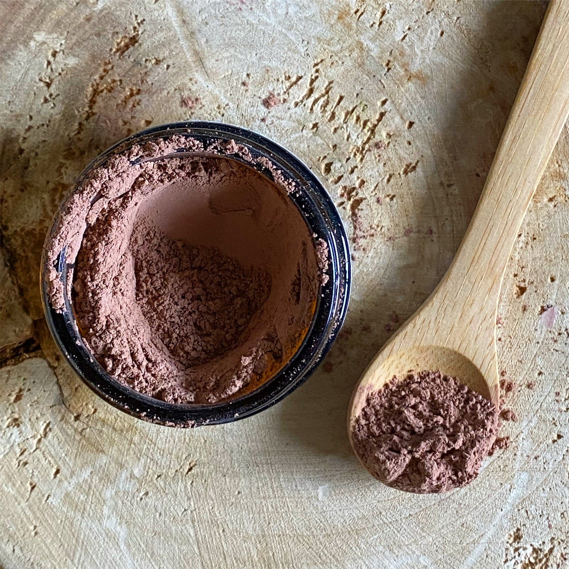 Himalayan Clay mud and salt mask with a small wood spoon